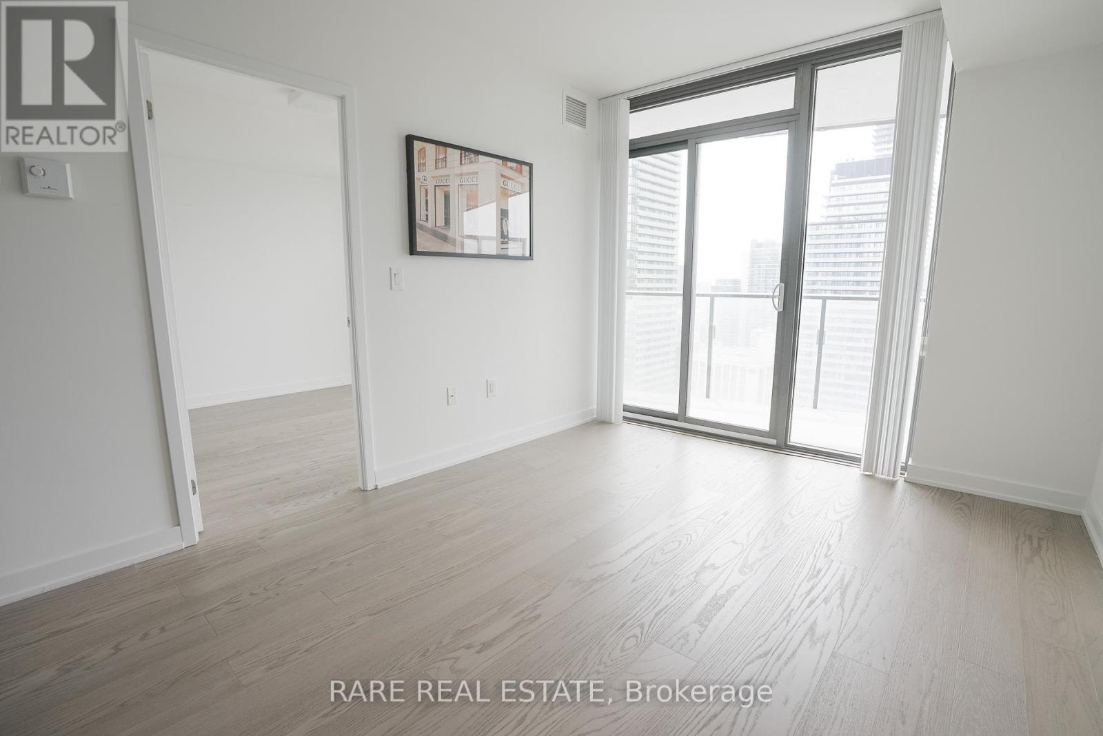 2703 - 11 Wellesley Street W, Toronto, Ontario  M4Y 0G4 - Photo 2 - C12441369