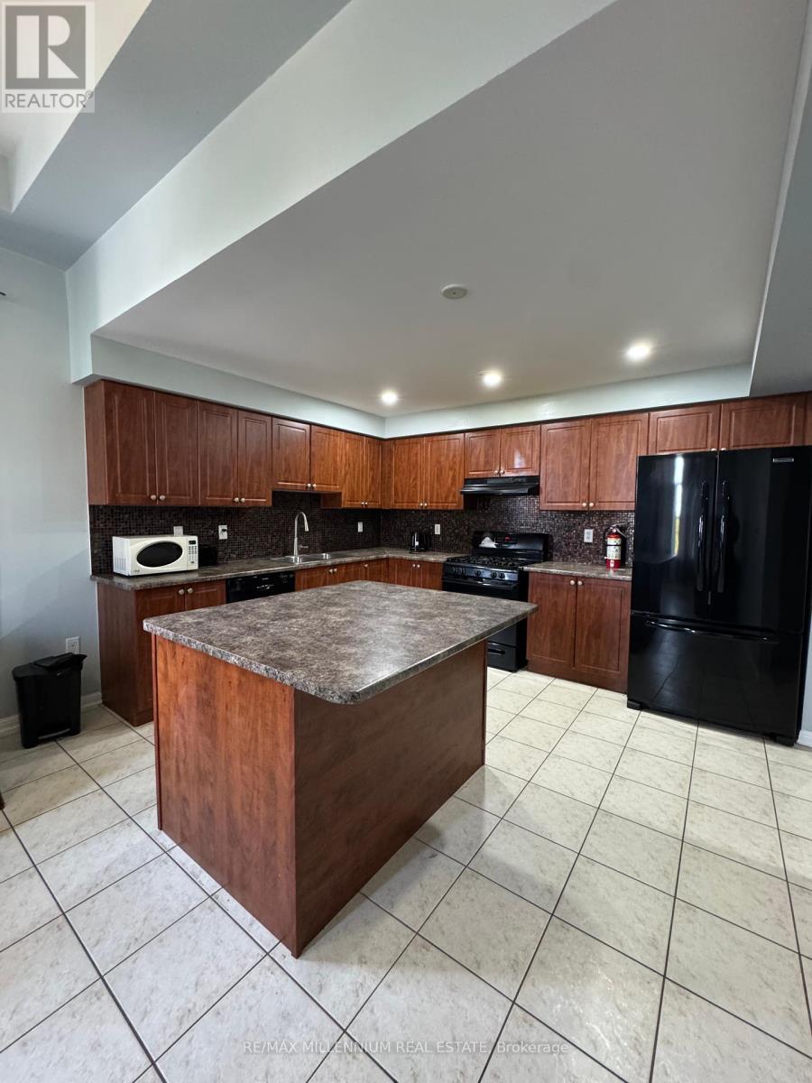 52 Commuter Drive, Brampton, Ontario  L7A 0R3 - Photo 6 - W12438465