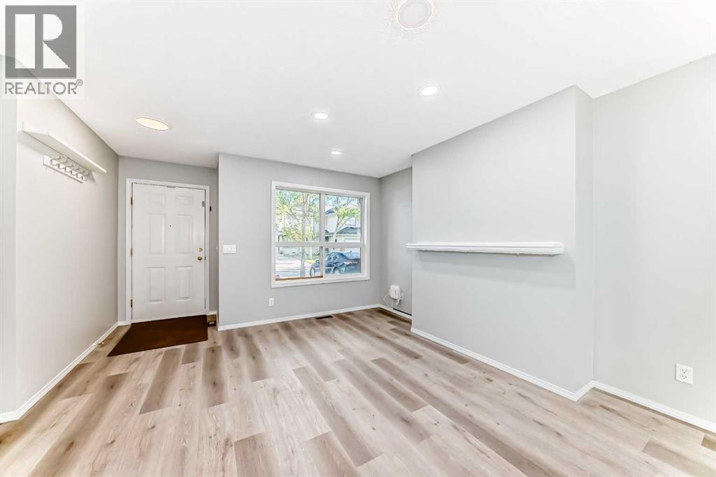 215 Harvest Gold Place Ne, Calgary, Alberta  T3K 4Y1 - Photo 5 - A2258620