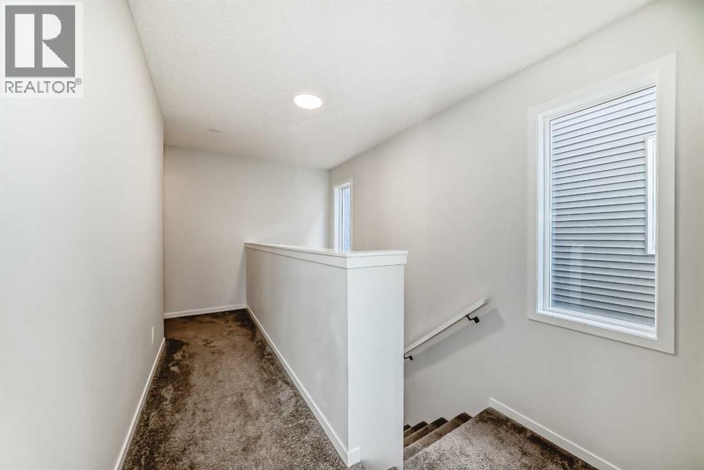 36 Edith Gate Nw, Calgary, Alberta  T3R 1Z2 - Photo 8 - A2261503