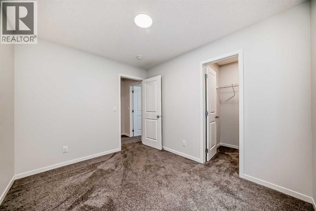 36 Edith Gate Nw, Calgary, Alberta  T3R 1Z2 - Photo 15 - A2261503