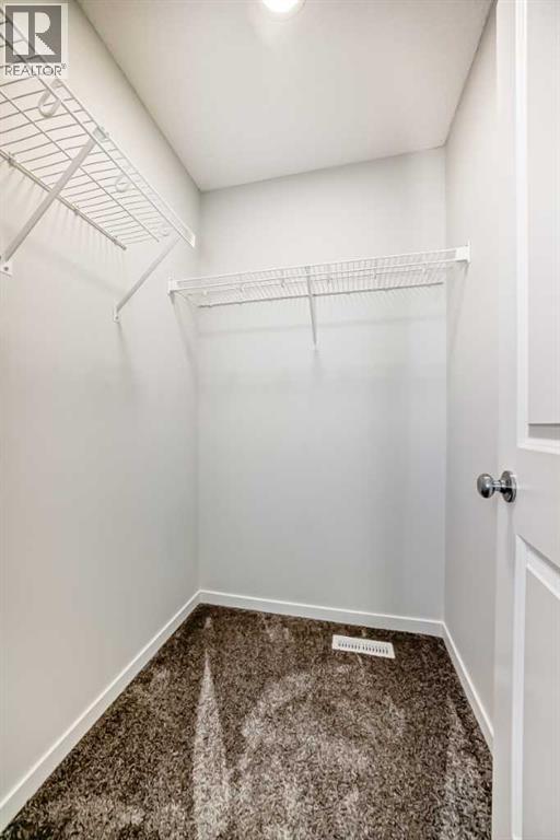 36 Edith Gate Nw, Calgary, Alberta  T3R 1Z2 - Photo 11 - A2261503