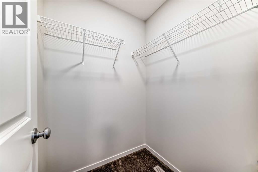 36 Edith Gate Nw, Calgary, Alberta  T3R 1Z2 - Photo 3 - A2261503