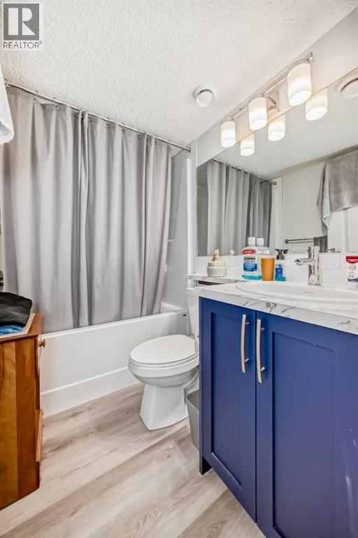 36 Edith Gate Nw, Calgary, Alberta  T3R 1Z2 - Photo 7 - A2261503