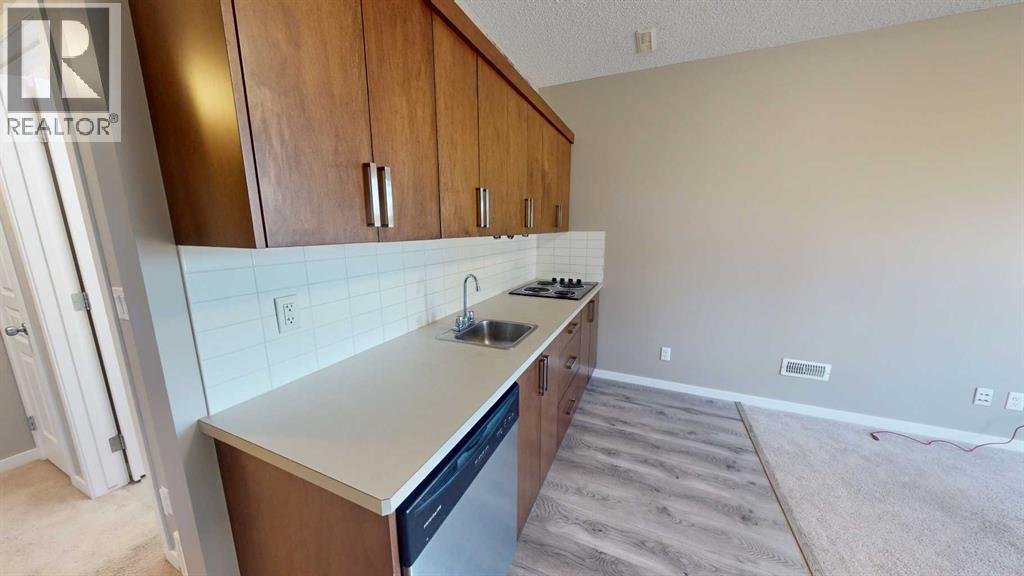 216 New Brighton Grove Se, Calgary, Alberta  T2Z 1G2 - Photo 5 - A2246047