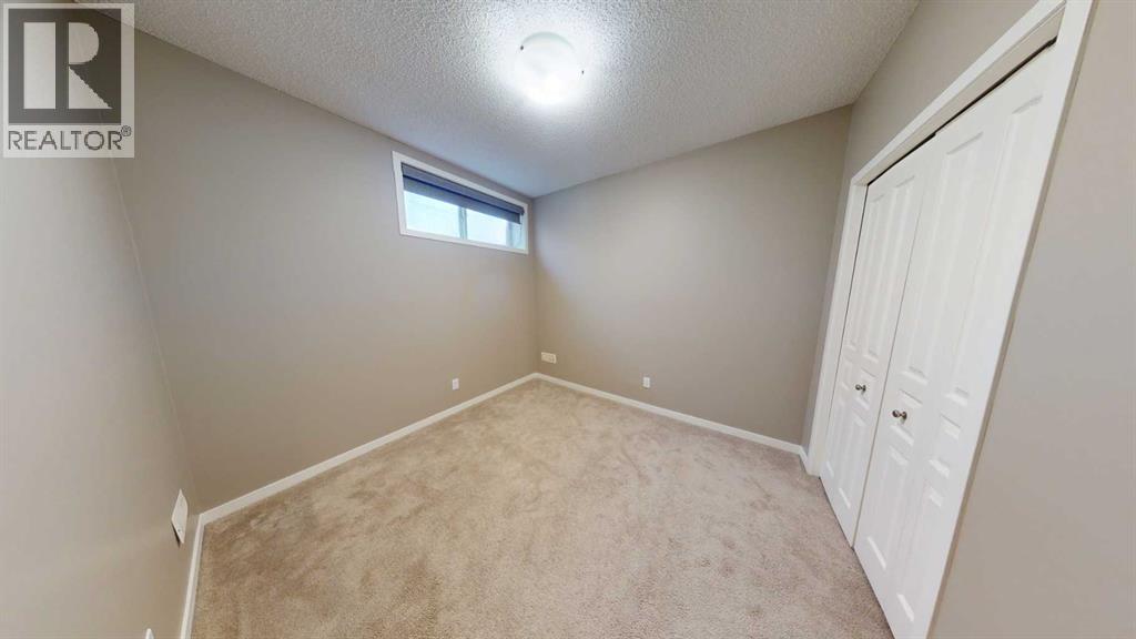 216 New Brighton Grove Se, Calgary, Alberta  T2Z 1G2 - Photo 8 - A2246047