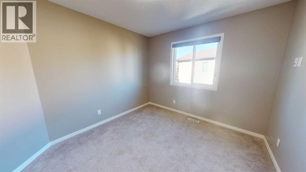 216 New Brighton Grove Se, Calgary, Alberta  T2Z 1G2 - Photo 22 - A2246047