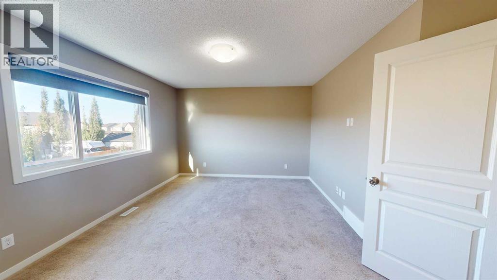 216 New Brighton Grove Se, Calgary, Alberta  T2Z 1G2 - Photo 18 - A2246047