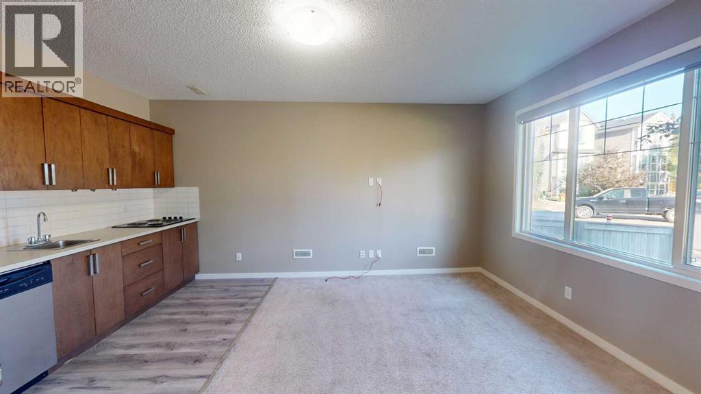 216 New Brighton Grove Se, Calgary, Alberta  T2Z 1G2 - Photo 2 - A2246047