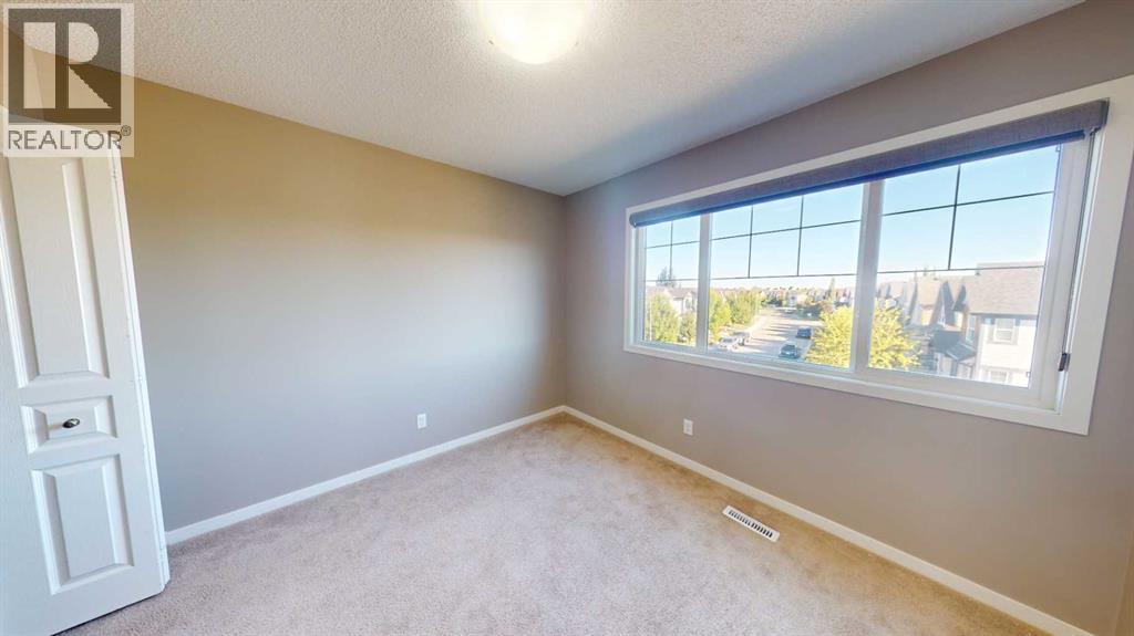 216 New Brighton Grove Se, Calgary, Alberta  T2Z 1G2 - Photo 23 - A2246047