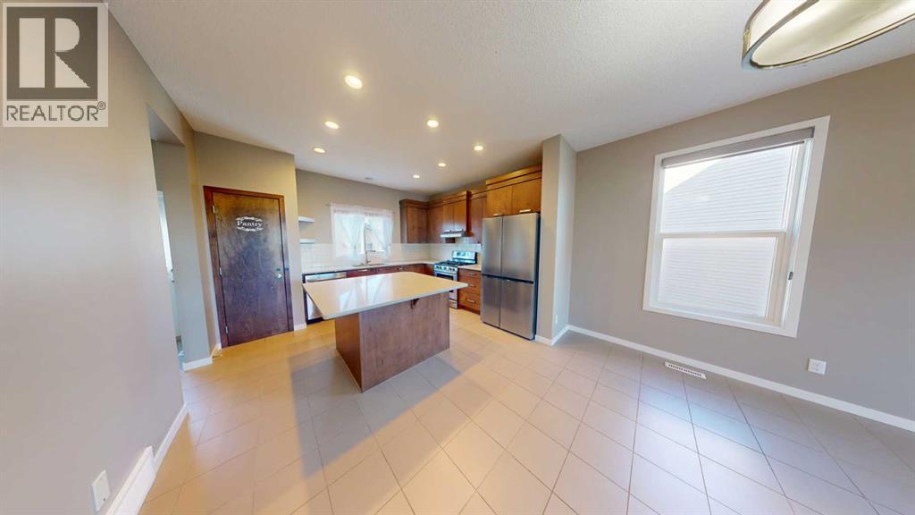 216 New Brighton Grove Se, Calgary, Alberta  T2Z 1G2 - Photo 10 - A2246047