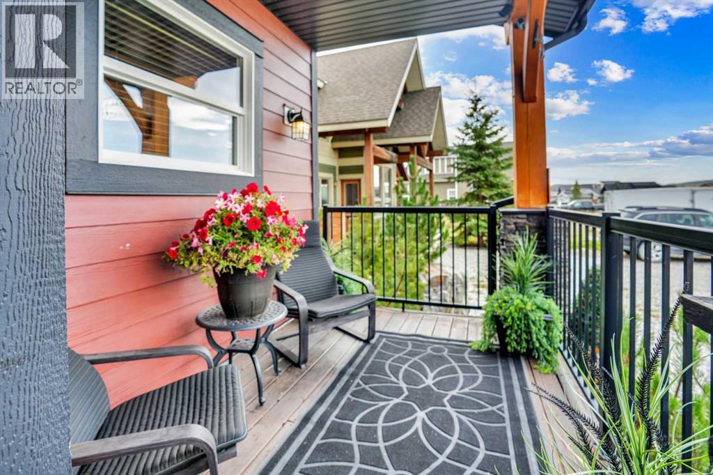 210 Cottageclub Crescent, Rural Rocky View County, Alberta  T4C 1B1 - Photo 3 - A2260091