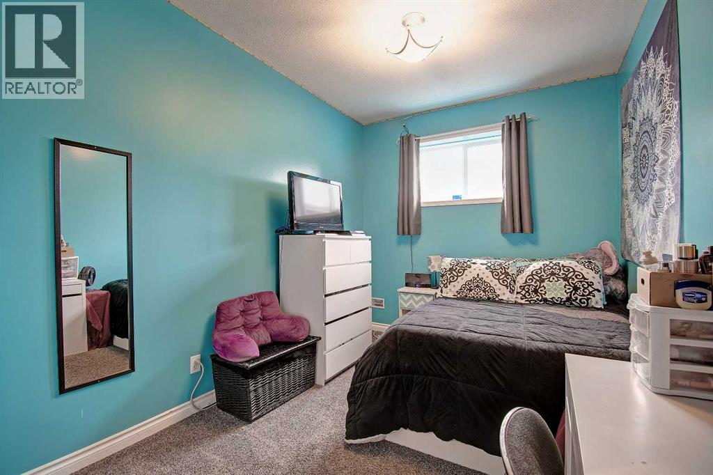 1047 Creek Springs Rise Nw, Airdrie, Alberta  T4B 2V5 - Photo 26 - A2261820