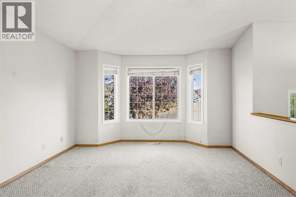 39 Saddlemont Manor Ne, Calgary, Alberta  T3J 4Z5 - Photo 6 - A2260865