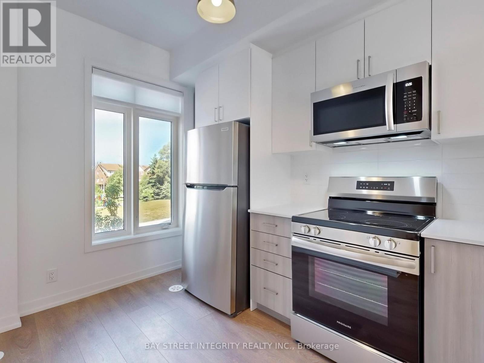 11 Case Ootes Drive, Toronto, Ontario  M4A 1C5 - Photo 4 - C12441672