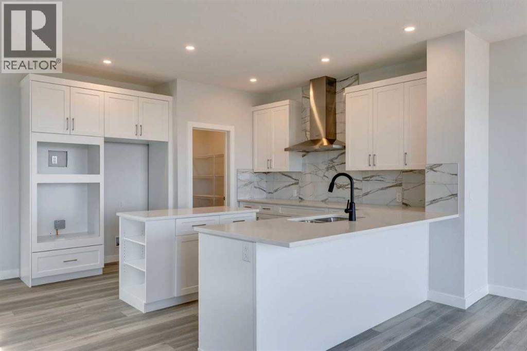 9 Wedderburn Gate, Okotoks, Alberta  T1S 5X2 - Photo 3 - A2257301