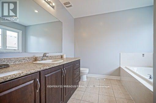 69 Natronia Trail, Brampton, Ontario  L6P 3N8 - Photo 9 - W12441729