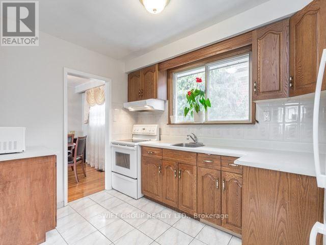 Main Floor - 80 Tansley Avenue, Toronto, Ontario  M1J 1P3 - Photo 13 - E12441792