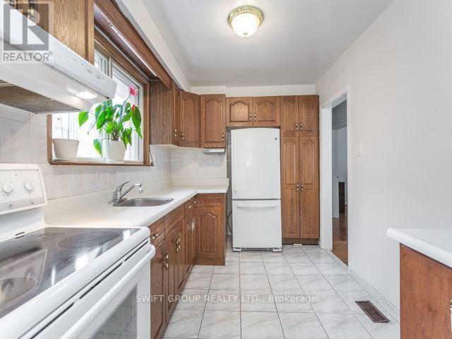 Main Floor - 80 Tansley Avenue, Toronto, Ontario  M1J 1P3 - Photo 14 - E12441792
