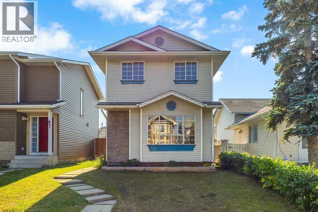 43 Martinwood Road Ne, Calgary, Alberta  T3J 3G6 - Photo 1 - A2261485