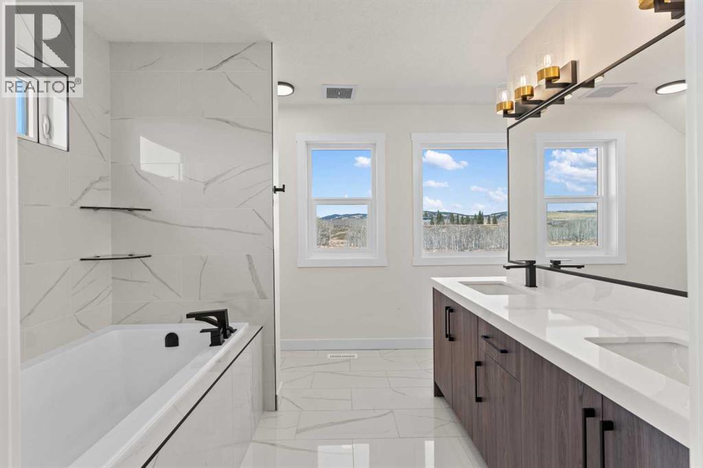 48 Cottageclub Lane, Rural Rocky View County, Alberta  T4C 1B1 - Photo 21 - A2221288