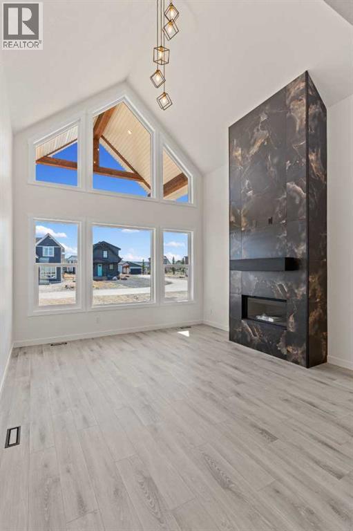 48 Cottageclub Lane, Rural Rocky View County, Alberta  T4C 1B1 - Photo 10 - A2221288