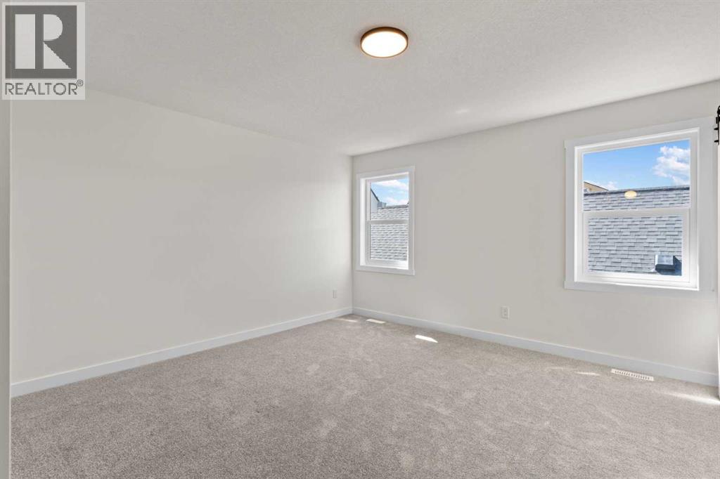 48 Cottageclub Lane, Rural Rocky View County, Alberta  T4C 1B1 - Photo 17 - A2221288