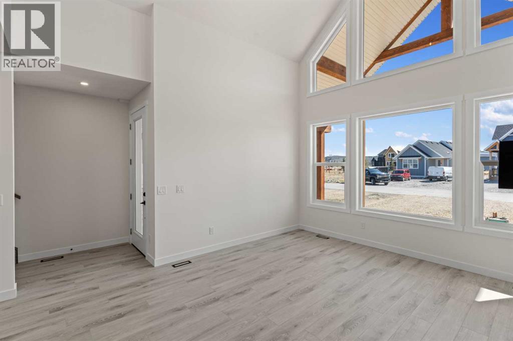 48 Cottageclub Lane, Rural Rocky View County, Alberta  T4C 1B1 - Photo 12 - A2221288