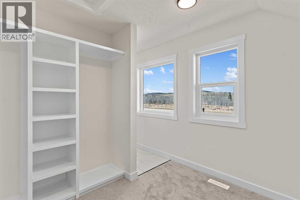 48 Cottageclub Lane, Rural Rocky View County, Alberta  T4C 1B1 - Photo 25 - A2221288