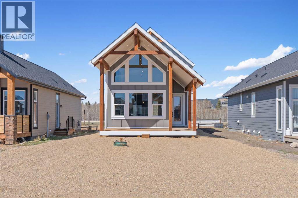 48 Cottageclub Lane, Rural Rocky View County, Alberta  T4C 1B1 - Photo 2 - A2221288