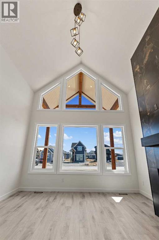 48 Cottageclub Lane, Rural Rocky View County, Alberta  T4C 1B1 - Photo 9 - A2221288