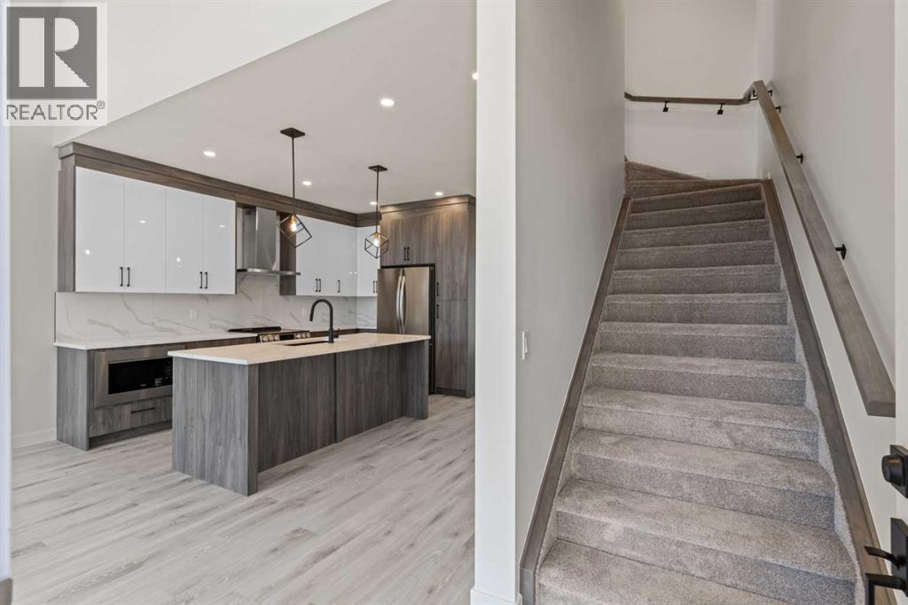 48 Cottageclub Lane, Rural Rocky View County, Alberta  T4C 1B1 - Photo 13 - A2221288