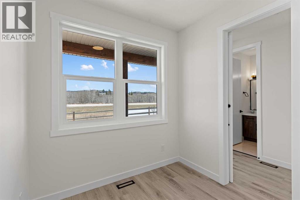 48 Cottageclub Lane, Rural Rocky View County, Alberta  T4C 1B1 - Photo 15 - A2221288