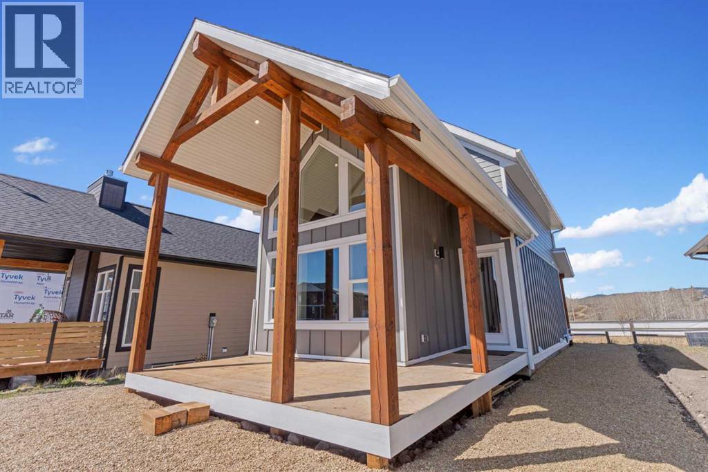 48 Cottageclub Lane, Rural Rocky View County, Alberta  T4C 1B1 - Photo 3 - A2221288