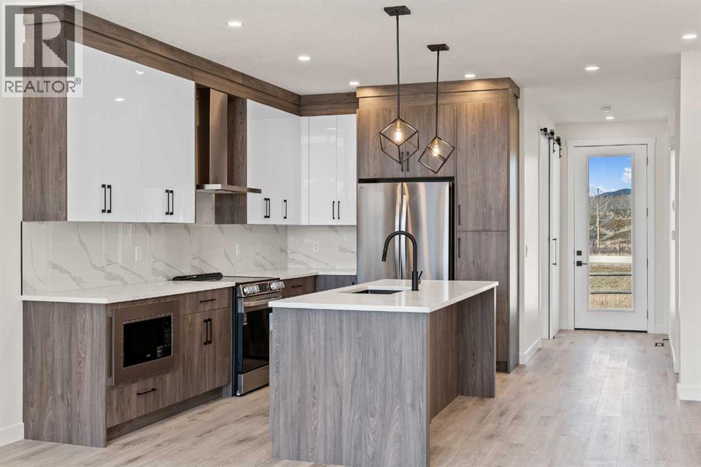 48 Cottageclub Lane, Rural Rocky View County, Alberta  T4C 1B1 - Photo 5 - A2221288