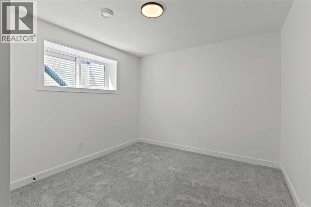 48 Cottageclub Lane, Rural Rocky View County, Alberta  T4C 1B1 - Photo 32 - A2221288