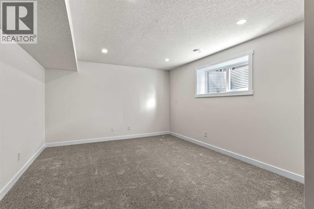 48 Cottageclub Lane, Rural Rocky View County, Alberta  T4C 1B1 - Photo 27 - A2221288