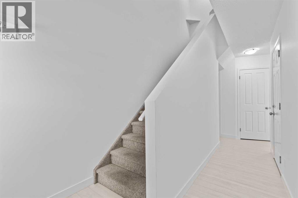 85 Panatella Villas Nw, Calgary, Alberta  T3K 0G6 - Photo 4 - A2258741
