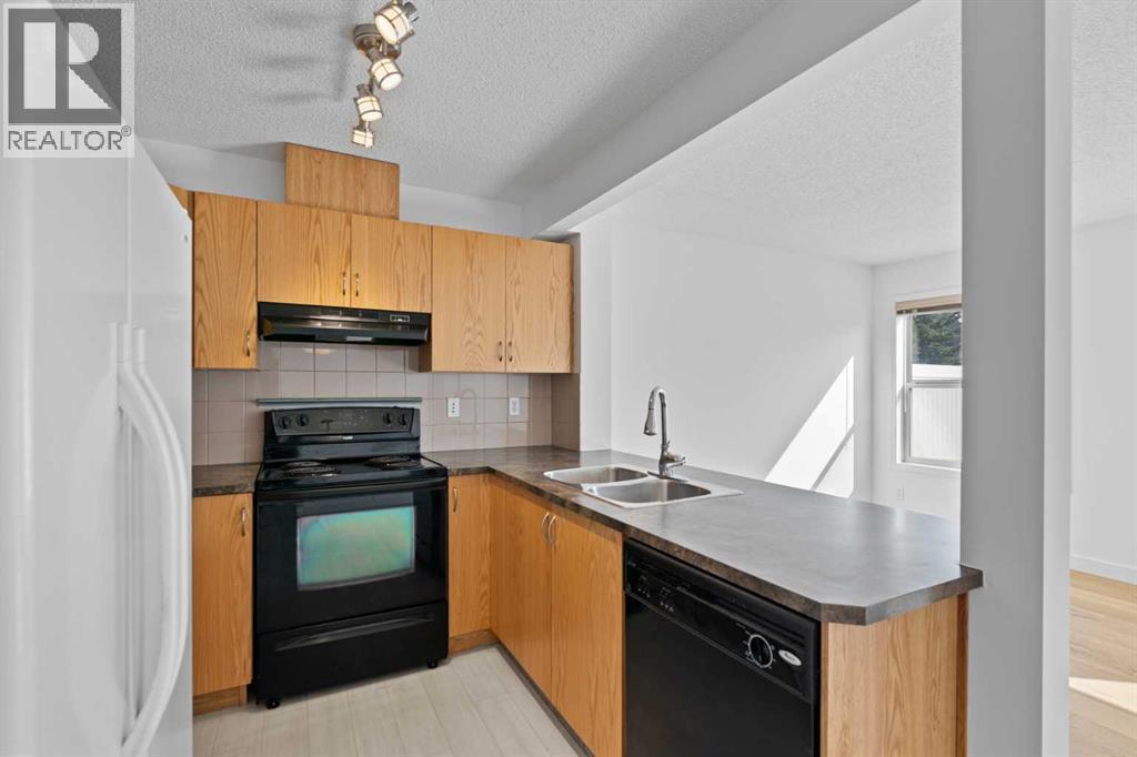 85 Panatella Villas Nw, Calgary, Alberta  T3K 0G6 - Photo 6 - A2258741