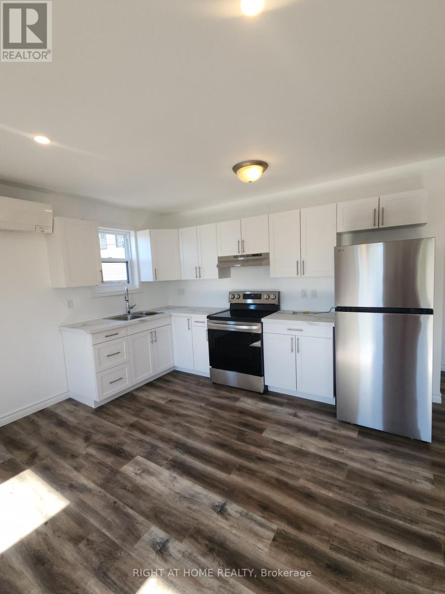 205 - 9 Queen Street W, Springwater, Ontario  L0L 1P0 - Photo 5 - S12441834
