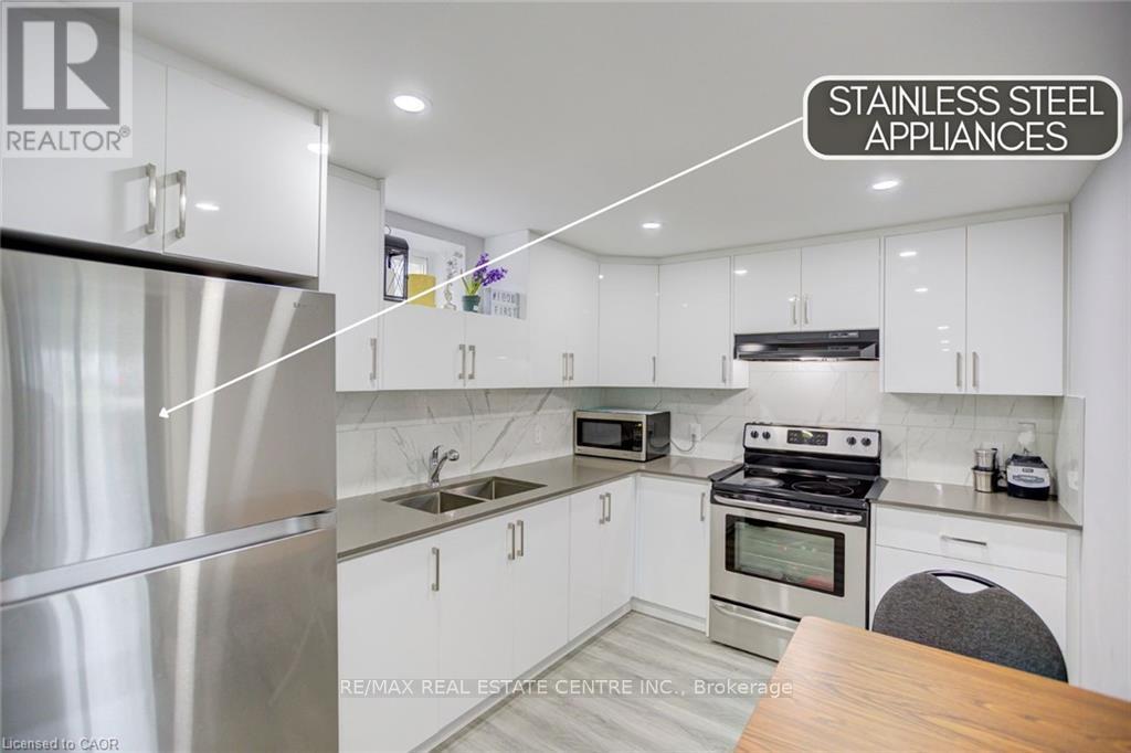 (Basement) - 21 Sandsprings Crescent, Kitchener, Ontario  N2E 2C6 - Photo 2 - X12441839