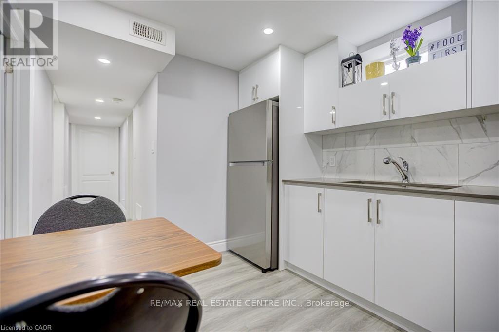 (Basement) - 21 Sandsprings Crescent, Kitchener, Ontario  N2E 2C6 - Photo 3 - X12441839