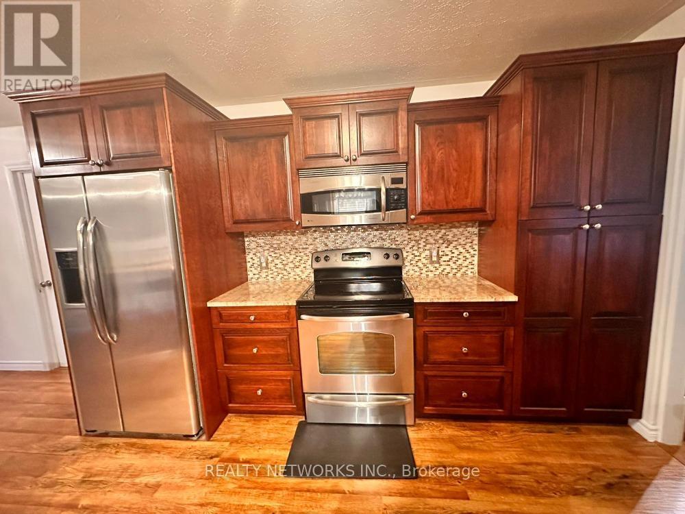 127 Jv Bonhomme Boulevard, Timmins (Tnw - Vic Heights), Ontario  P4P 1A2 - Photo 3 - T12441898