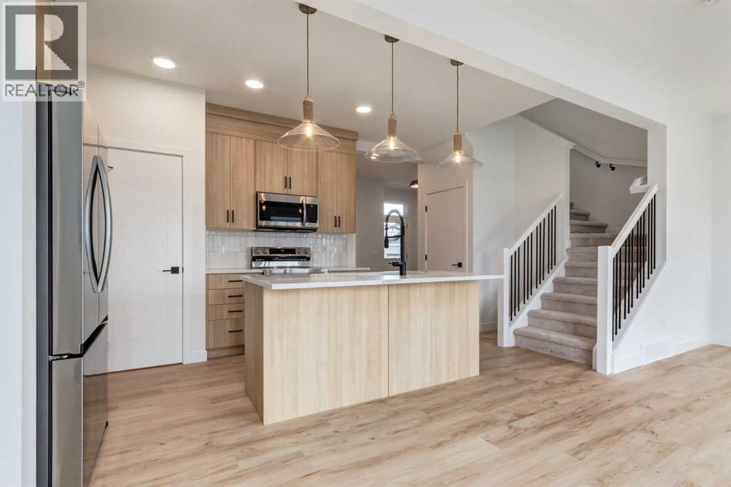 27 Belgian Court, Cochrane, Alberta  T4C 3H5 - Photo 4 - A2260251