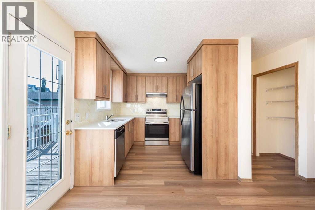 216 Hidden Hills Road Nw, Calgary, Alberta  T3A 5Y1 - Photo 5 - A2256233