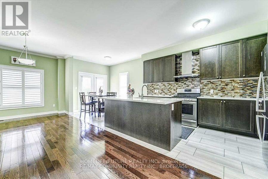84 Wimbledon Court, Whitby, Ontario  L1P 0A6 - Photo 7 - E12441877