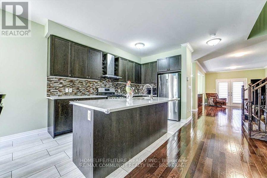 84 Wimbledon Court, Whitby, Ontario  L1P 0A6 - Photo 8 - E12441877