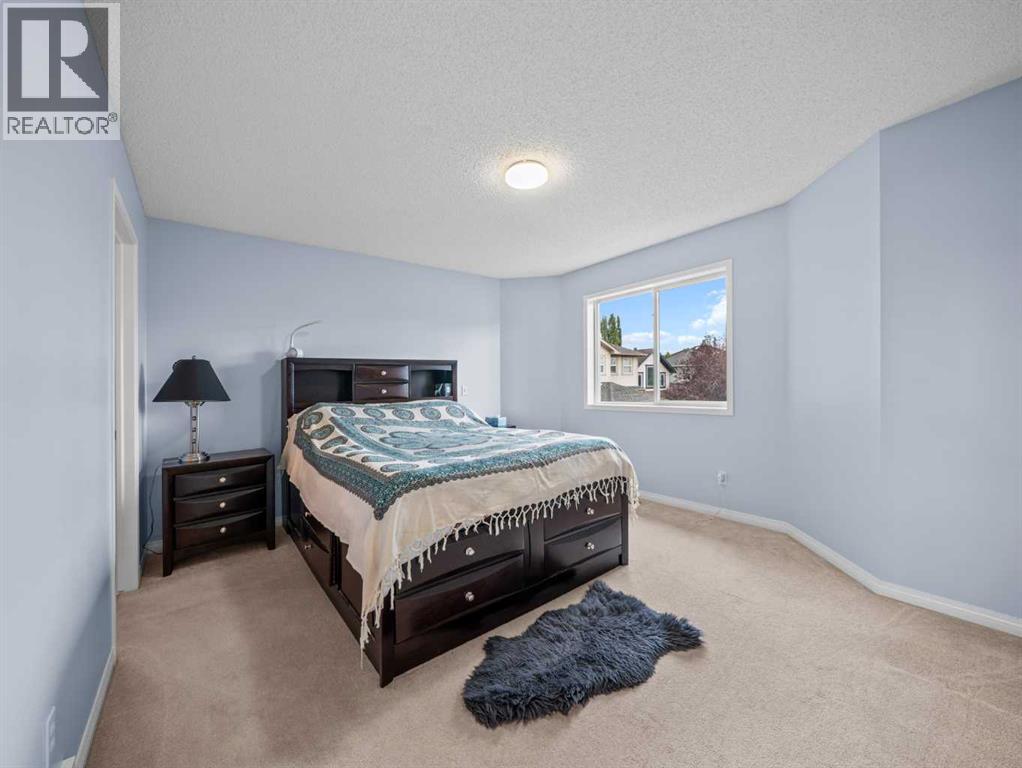 104 Rocky Ridge Heath Nw, Calgary, Alberta  T3G 4Z8 - Photo 14 - A2261861