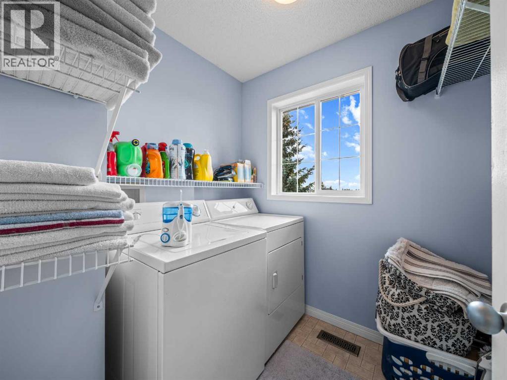 104 Rocky Ridge Heath Nw, Calgary, Alberta  T3G 4Z8 - Photo 20 - A2261861