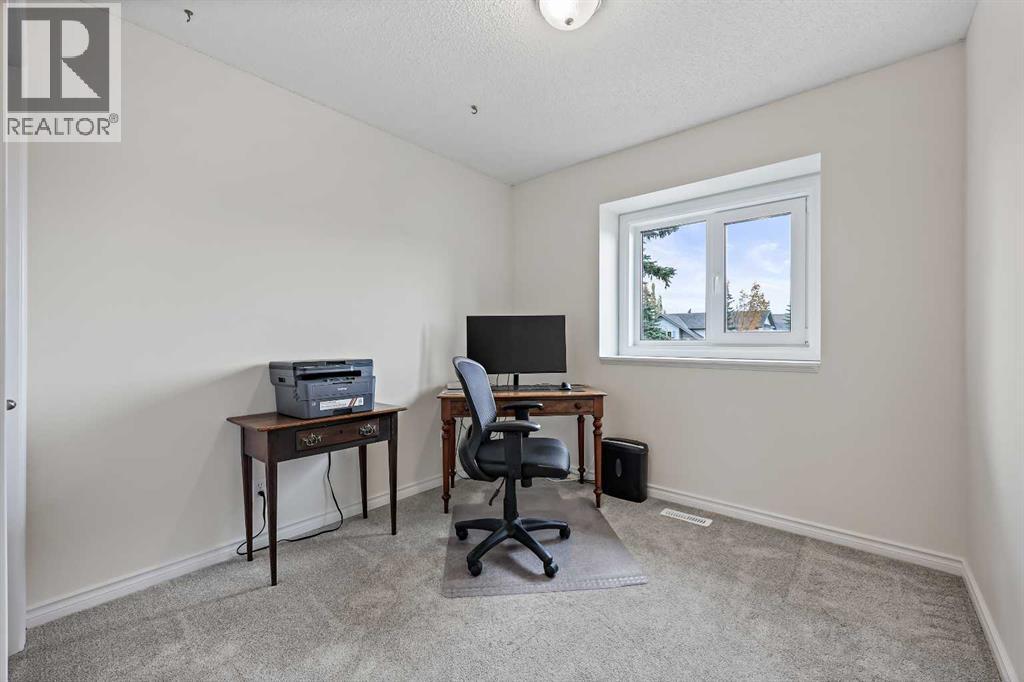 87 Quigley Drive, Cochrane, Alberta  T4C 1L5 - Photo 18 - A2261383